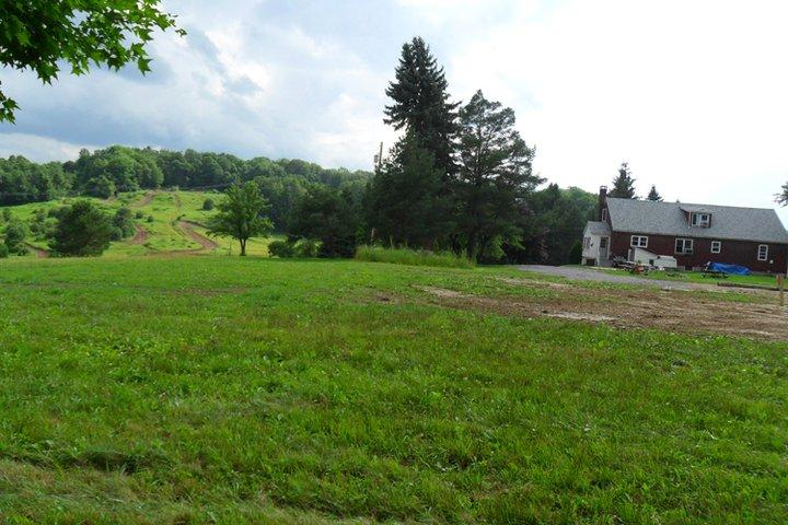 From the backyard towards lodge & motocross track in backgroung